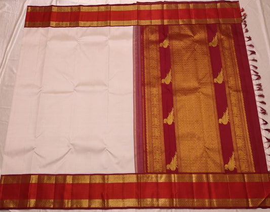 Timeless Ivory Silk Saree with Traditional Red & Gold Zari Border