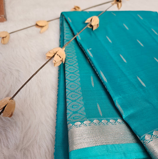 Exquisite Teal Blue Saree with Silver Dot Motifs & Intricate Border